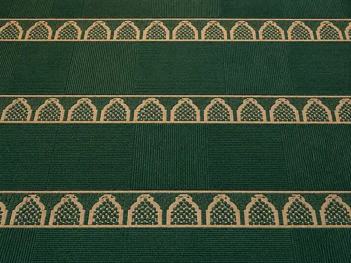 Mosque carpet with saff prayer lines