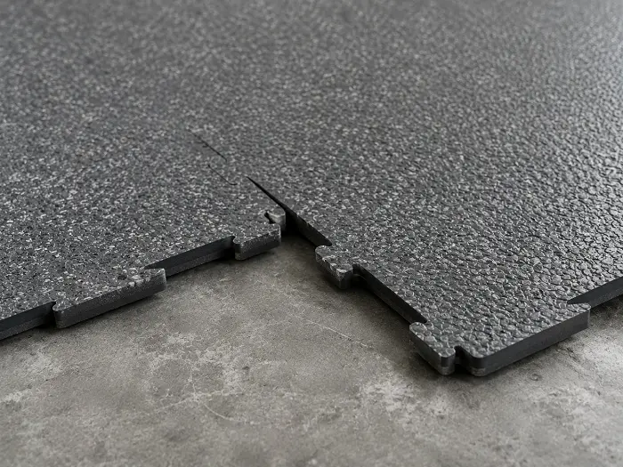 Interlocking PVC floor tiles