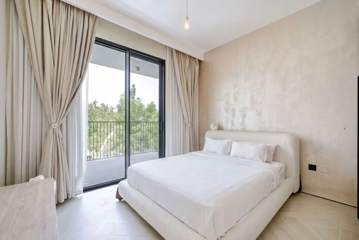 Chevron wood-look SPC flooring in a villa bedroom, Tilal Al Ghaf Dubai