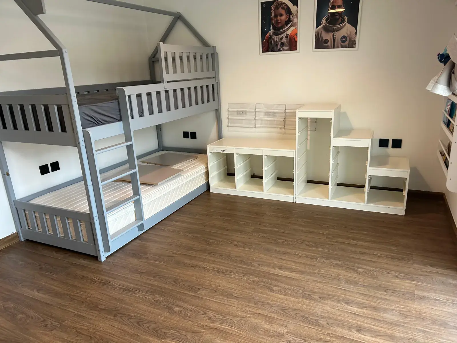 Brown wood-look SPC flooring in a children's bedroom with bunk beds, JVT District 8 villa Dubai