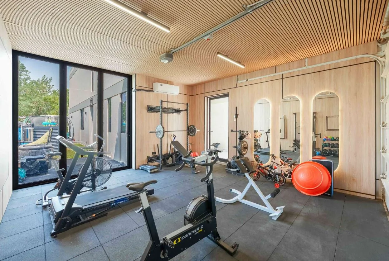 Interlocking rubber gym flooring in a home gym, Tilal Al Ghaf villa Dubai