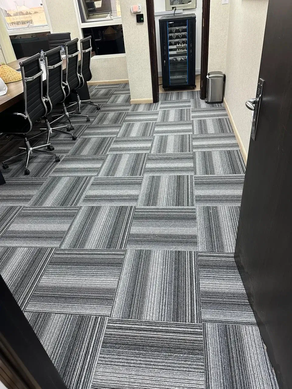 Striped grey carpet tiles in an office meeting room, Al Nahyan Abu Dhabi