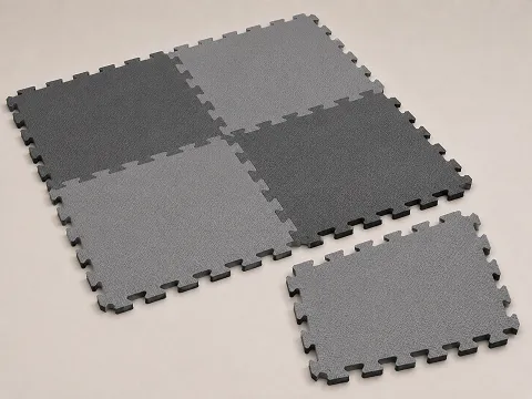Interlocking EVA foam tiles with jigsaw edges, shown partly assembled