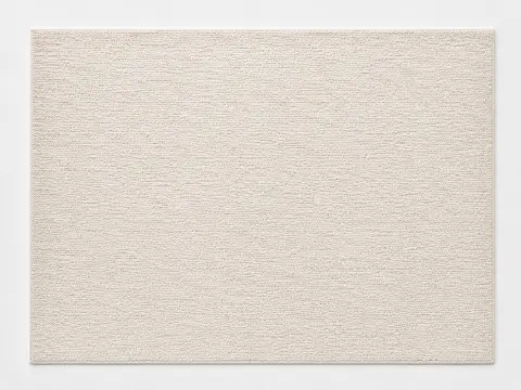 Soft pale low-pile rug suitable for a nursery, shown flat