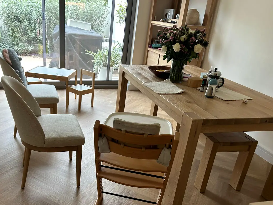 Herringbone LVT flooring in a villa dining area with garden doors at The Springs, Dubai