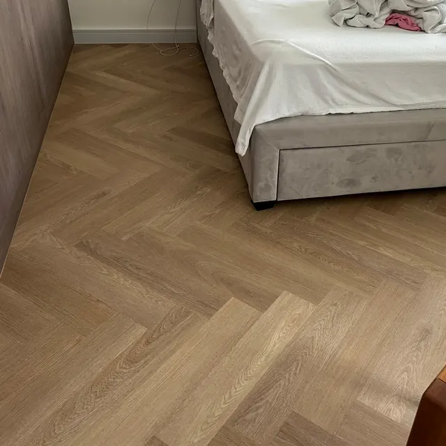 Herringbone LVT flooring in the main bedroom of a villa at The Springs, Dubai