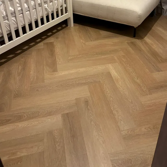 Herringbone LVT flooring in a nursery at The Springs villa, Dubai