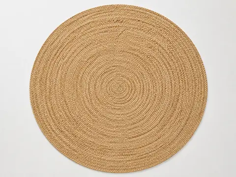 Jute round area rug with a natural woven texture