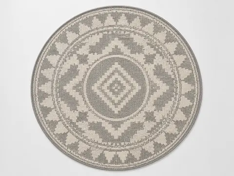 Polypropylene round outdoor area rug with a flat weave