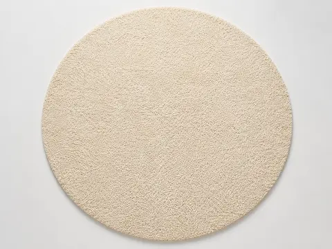 Wool round area rug with a soft dense pile
