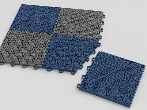 Interlocking modular sports floor tiles with an open grid surface, partly assembled